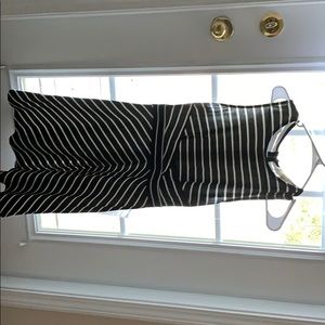 Sleeveless black and white dress with zipper. NWOT